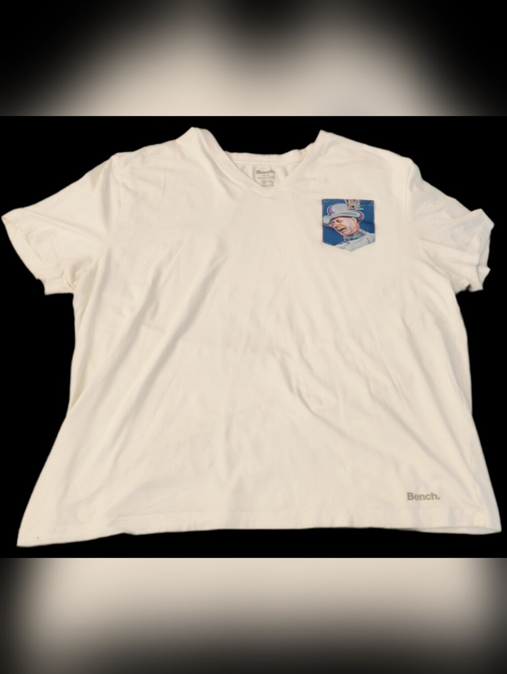 #MC131 Bench White V-Neck Tee with Blue Pocket Graphic